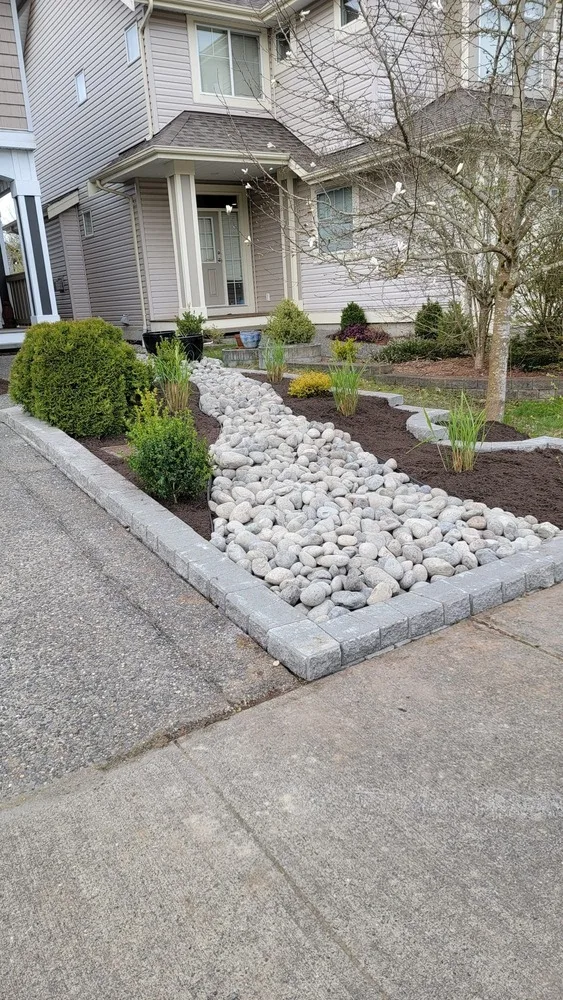 concrete garden wall and rock garden