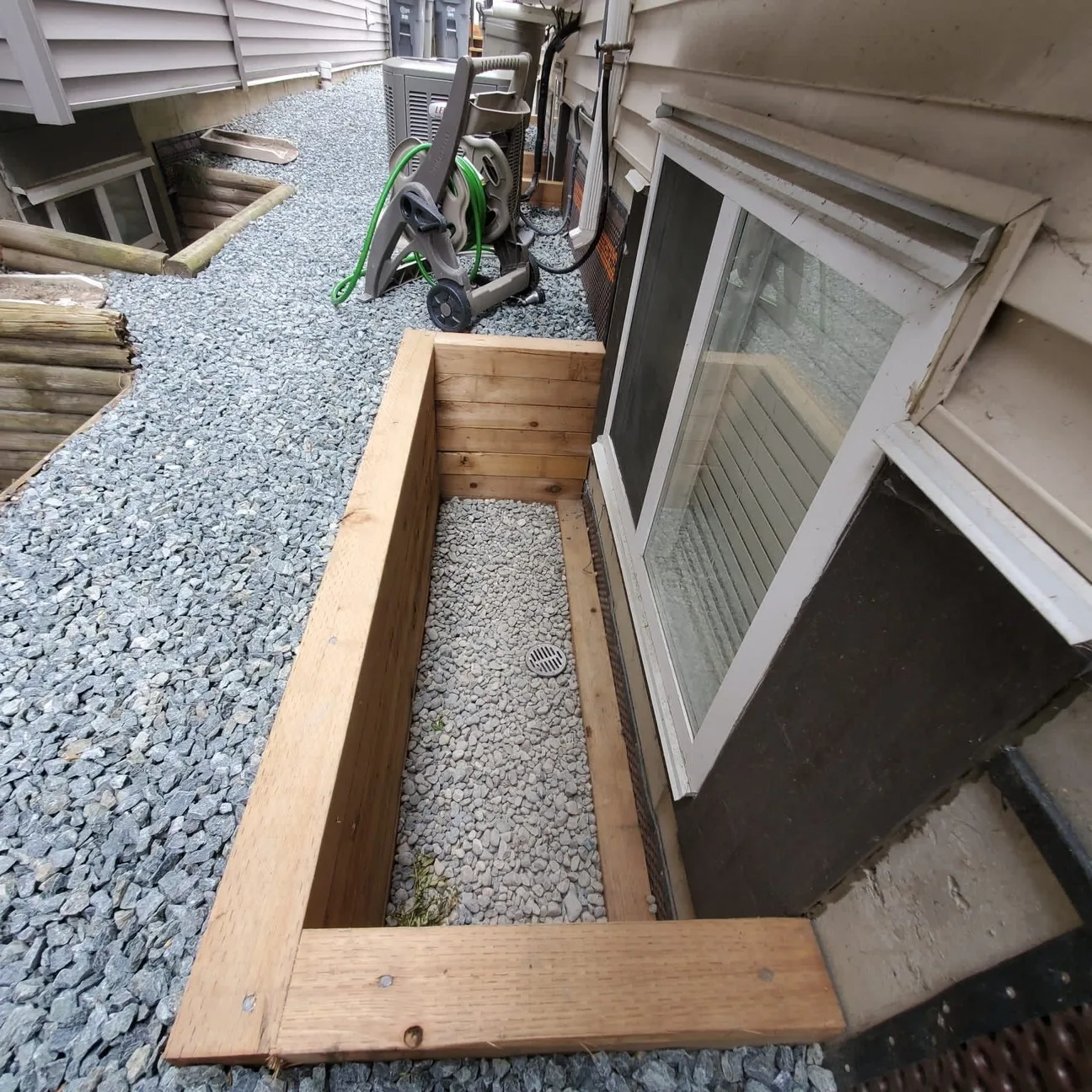 replaced wood tie window well