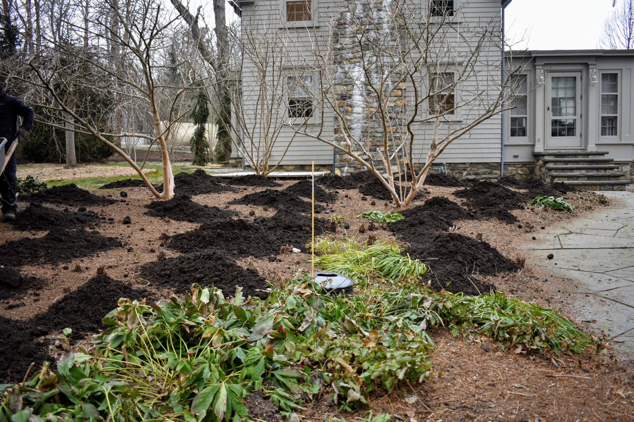 composted bark mulch in piles